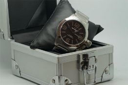 Gentleman's TW Steel NOS Wristwatch, circular black dial, screw in crown, with box.