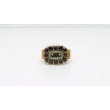 Garnet and seed pearl Victorian mourning ring, central panel with a border of pearls, counter border