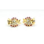 Pair of diamond and ruby bow earrings, rose and old cut diamonds set with round cut rubies, in