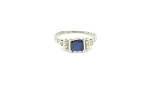 Art deco Sapphire and diamond ring, central square cut sapphire, stepped diamond set shoulders,