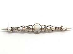Pearl and diamond bar brooch, graduating button pearls, separated by old cut diamonds, in a target