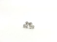 A pair of single stone diamond ear studs, oval cut diamonds, weighing en estimated 0.80ct each,