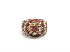 Early Indian ruby diamond and enamel ring, central ruby surrounded by four polki diamonds, with red,