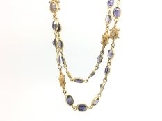 Blue stone necklace, oval cut blue stones, with diamond set spacers, in silver gilt