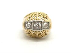 Three stone diamond ring, three old cut diamonds, in a pierced, openwork, bombÃ© style mount, with