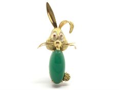 French gem set rabbit brooch, green chalcedony body with ruby eyes, textured bark effect gold