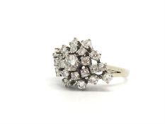 Diamond cluster ring, round brilliant cut diamonds, set in white metal stamped 750, 585, ring size