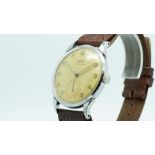Gentlemen's Tissot Vintage Wristwatch, circular patina dial with arabic numerals and a large