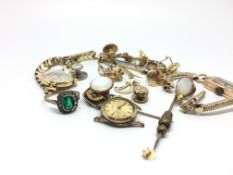 A collection of gold and other jewellery. Including three watches, a ring, buttons and brooches.