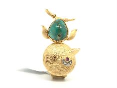 Turquoise and gold French bird brooch, with ruby and diamond set eyes, bearing French standard marks