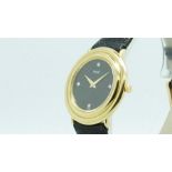 Gentlemen's Piaget Gold Diamond Dot Wristwatch, circular black dial with diamond dot hour markers,