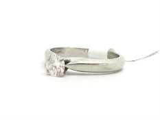Single stone diamond ring, round brilliant cut diamond weighing an estimated 0.33ct, set in