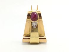 French Art Deco ruby and diamond clip, oval cabochon cut ruby measuring 9.4 x 6.6mm, with two square