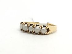 Split pearl five stone ring, carved half hoop with five split pearls, in yellow metal stamp and