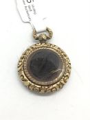 Georgian glass fronted mourning locket, circular case, engraved detail, 21.7mm diameter, with a lock