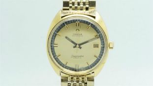 Gentlemen's Omega Seamaster Cosmic Date Wristwatch, circular gold dial two tone hour markers and a