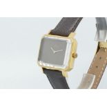 Vintage Omega Retro Wristwatch, rectangular dial with gold plated case, on black leather strap.