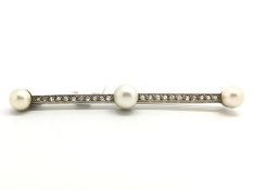 Edwardian French pearl and diamond brooch, cental pearl measuring approximately 8mm, with a 7mm