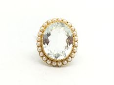 Victorian aquamarine and pearl dress ring, large oval cut aquamarine approximately 20x17mm,