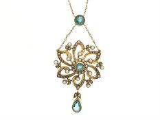 Art Nouvea blue zircon and pearl pendant, central blue zircon with a halo of seed pearls, six