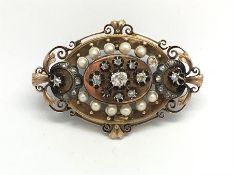 French pearl and diamond brooch, oval design, central cluster of old cut diamonds, with a surround