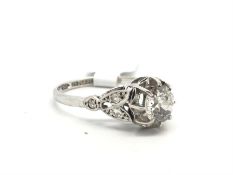 Single stone diamond ring, old cut diamond weighing an estimated 1.00ct, with diamond set shoulders,