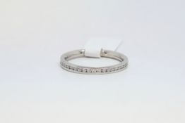 Diamond full eternity ring, round brilliant cut diamonds weighing an estimated 0.31ct, channel set