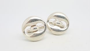 GUCCI - A pair of silver Gucci cufflinks, button fronts with sprung torpedo fittings