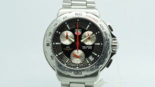 Gentlemen's Tag Heuer Indy 500, black dial, three register chronograph, outer rotating bezel,