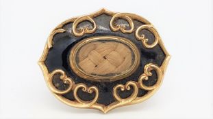 9ct yellow gold and black enamel mourning brooch, measures 50 x 40mm