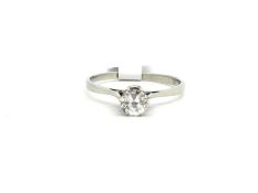 Single stone diamond ring, old cut diamond weighing an estimated 0.38ct, set in white metal, ring
