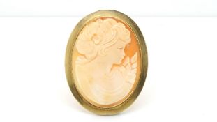 Cameo brooch, 39x30mm shell cameo, plain edge border, pendant and brooch fitting, tested as 9ct