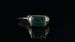 Single stone emerald ring, rectangular cabochon emerald, rubover set in yellow gold, bearing