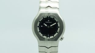 Ladies' Tag Heuer, black dial with integrated stainless steel bracelet, ref. WP1310.