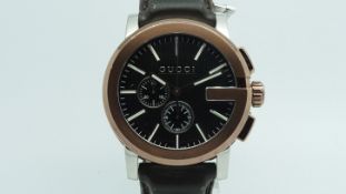 Gucci oversized, circular black and rose dial, G style bezel, original brown leather strap and