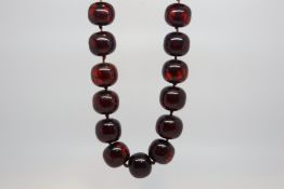 Large single row of vintage cherry amber beads, 25 beads approximately 18x16mm each strung