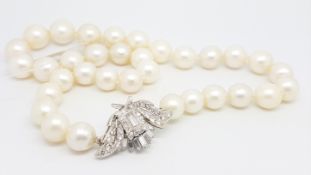Pearl and diamond necklace, single row ow large 12.5mm - 10.5mm silvery/white pearls strung knotted,