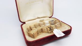 9ct yellow gold panel bracelet with engraved detail, hallmarked Birmingham, gross weight