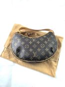 LOUIS VUITTON- A Louis Vuitton leather Croissant P