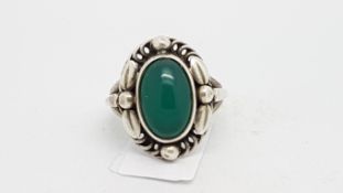 GEORG JENSEN- A silver ring, design mark 1A, set with a green chalcedony, signed Georg Jenson,