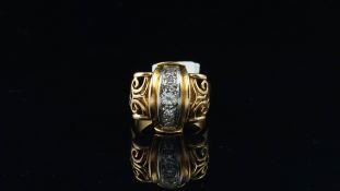 French diamond ring, vertical row of round brilliant cut diamonds, with carved scroll work detail to