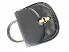 SALVATORE FERRAGAMO- A Salvatore Ferragamo vintage small leather top handle bag, yellow metal