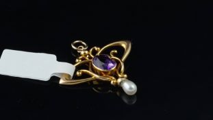 Art Nouveau amethyst and pearl pendant, in yellow metal stamped and tested as 15ct