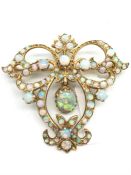 Art Nouveau style opal pendant, round and oval cabochon cut opals, set in yellow metal, boxed