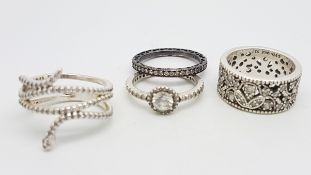PANDORA - Four silver Pandora rings including, stone set cluster ring, snake band, wide stone set