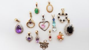 Selection of thirteen 9ct gold gem set pendants, gross weight approximately 10.79 grams