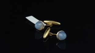 Pair of chalcedony cufflinks, sugarloaf cabochon chalcedony, set in yellow metal