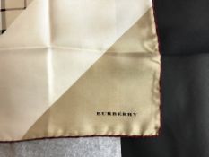 BURBERRY- A Burberry check small scarf, rolled burgundy edge, approximately 48cm x 48cm, with tags