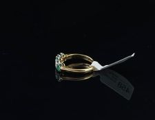 Five stone emerald and diamond ring, alternating emeralds and round brilliant cut diamonds, in