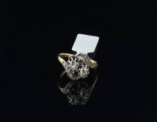 Diamond twist ring, two old cut diamonds, crossover set with rose cut diamond detail, mounted in